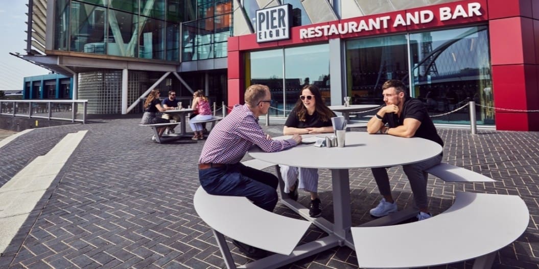 Image of a pair of La Grande Ronde picnic tables outside the Lowry Gallery, Salford Quays