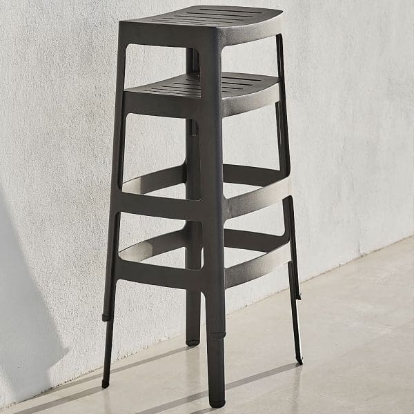 Image of Cane-line Cut modern outdoor bar stools in black alumium