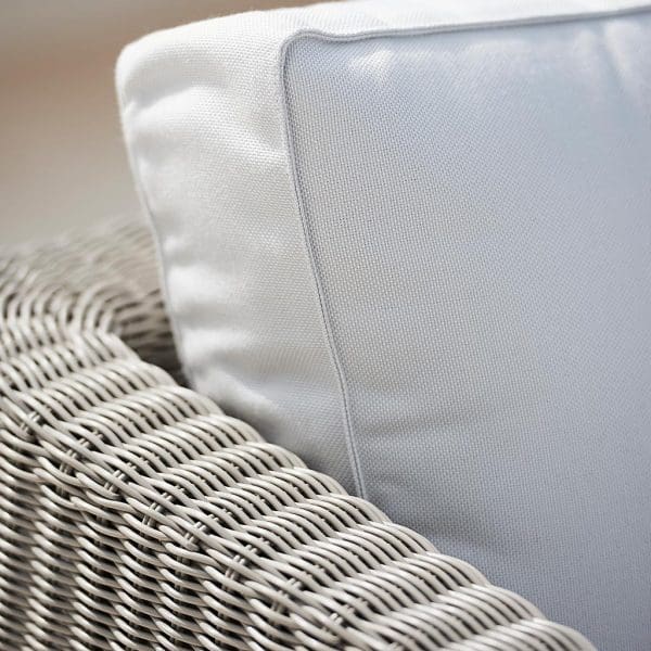 Image of detail of taupe Cane-line weave and White Cane-line Natté cushions used for Connect modular garden sofa