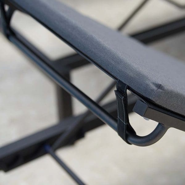 Image of detail of adjustable headrest mechanism of Relax sun lounger by Cane-line