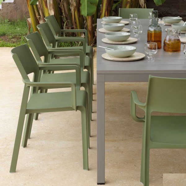 Image of Trill green garden armchairs and Rio taupe modern garden table by Nardi