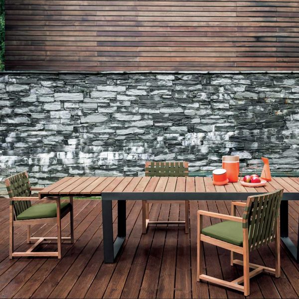 Image of RODA Spinnaker extentable garden table with anthracite frame and teak top, together with Network modern teak chairs