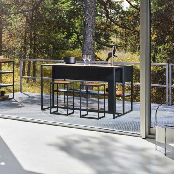Aerial view of Roshults Open Kitchen BBQ and Open Bistro furniture on a shaded terrace