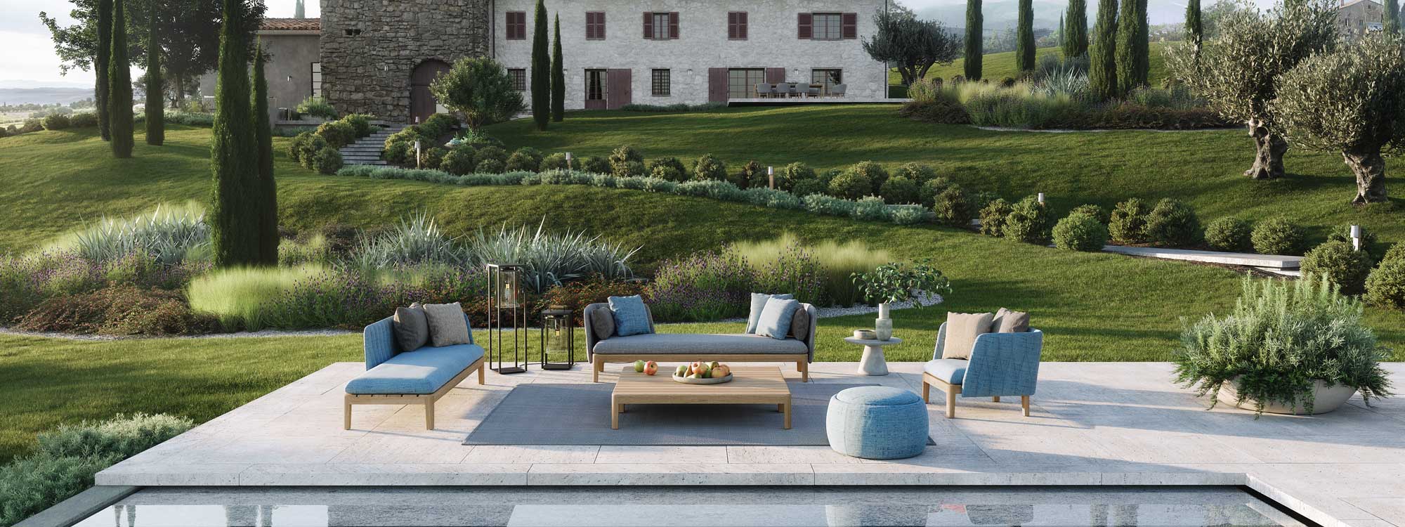 Image of Royal Botania Calypso garden furniture on poolside terrace in front of Italian villa surrounded by rolling countryside punctuated by Cypress trees