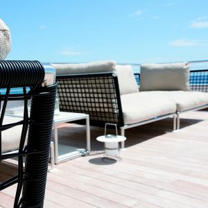 Image of Coro Nest luxury yacht furniture on teak aft deck of a superyacht