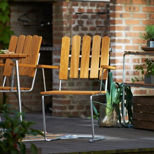 Image of A2 vintage cantilever garden chairs and table in oiled FSC oak and galvanised steel by Grythyttan Stålmobler