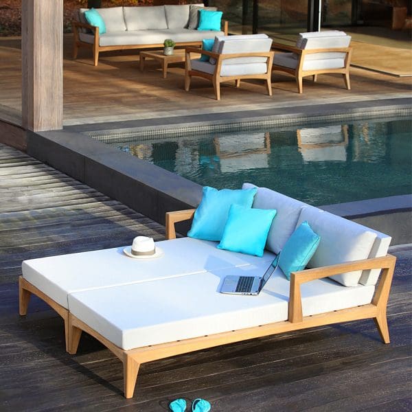 Image of pair of Royal Botania Zenhit teak daybeds placed together to create a large twin daybed