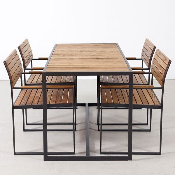 Image of Roshults Garden Bistro dinner table and chairs with architectural design in teak and anthracite stainless steel