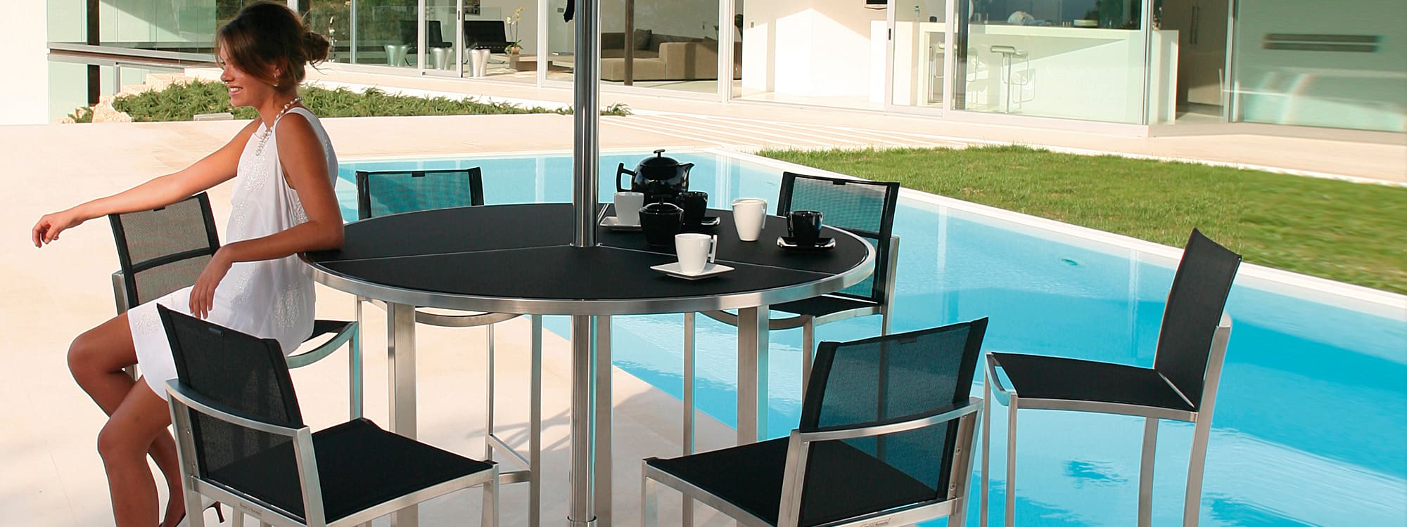 Image of Royal Botania OZN 43T bar stools in brushed stainless steel and black batyline fabric