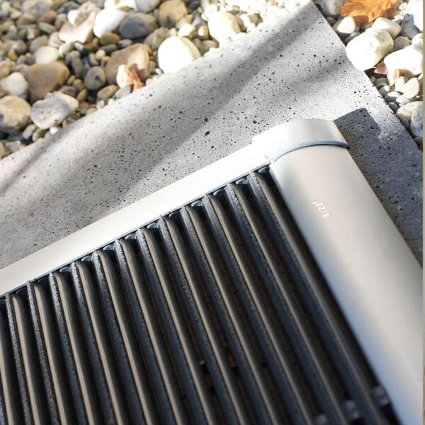 Image of detail of RiZZ The New Standard anodised aluminium doormat with high quality nylon brushes held within a stainless steel and resin housing
