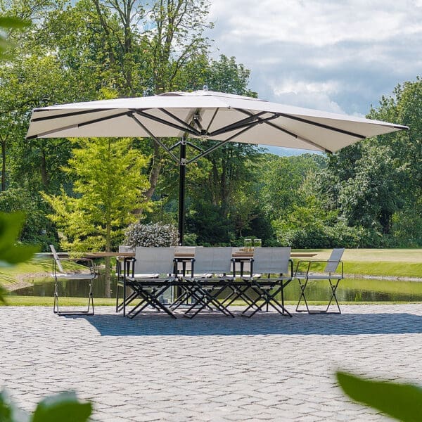 Image of Tuuci Ocean Master Max cantilever parasol with black mast and ribs and white canopy