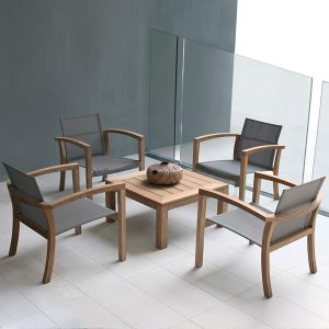 Image of Royal Botania XQI teak lounge chairs with Bronze Batyline seat and back, together with square XQI low table