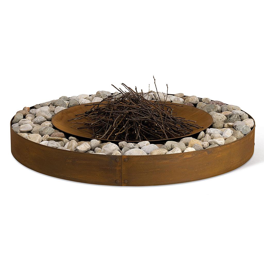 Studio image of Zen circular fire bowl filled with kindling ready to light