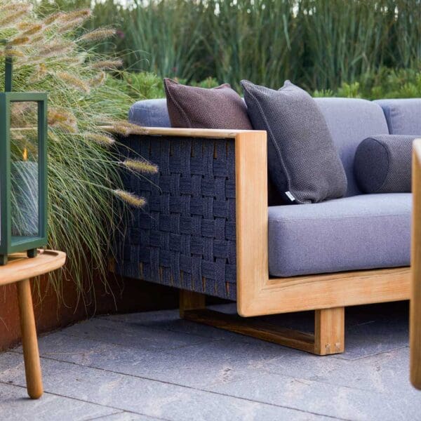 Image of Cane-line Angle teak sofa and Royal Teak side table