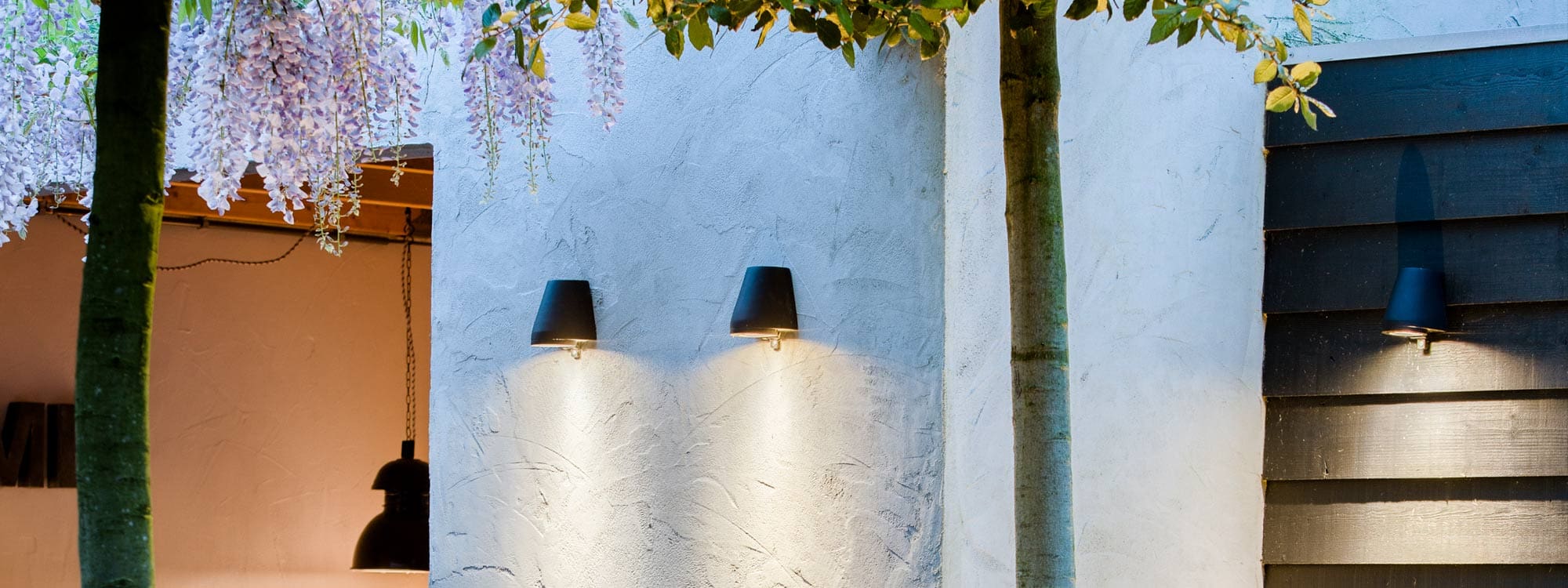 Image of lit Beam outdoor wall down lights by Royal Botania