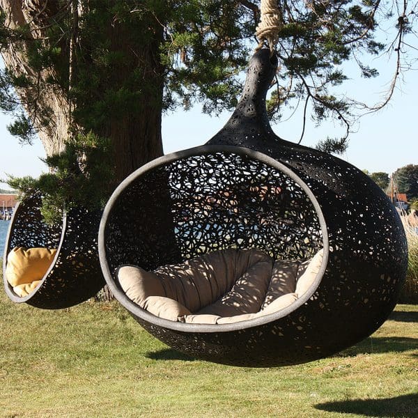 Bios Hide swing chair has unique naturally inspired design and provides captivating garden art.