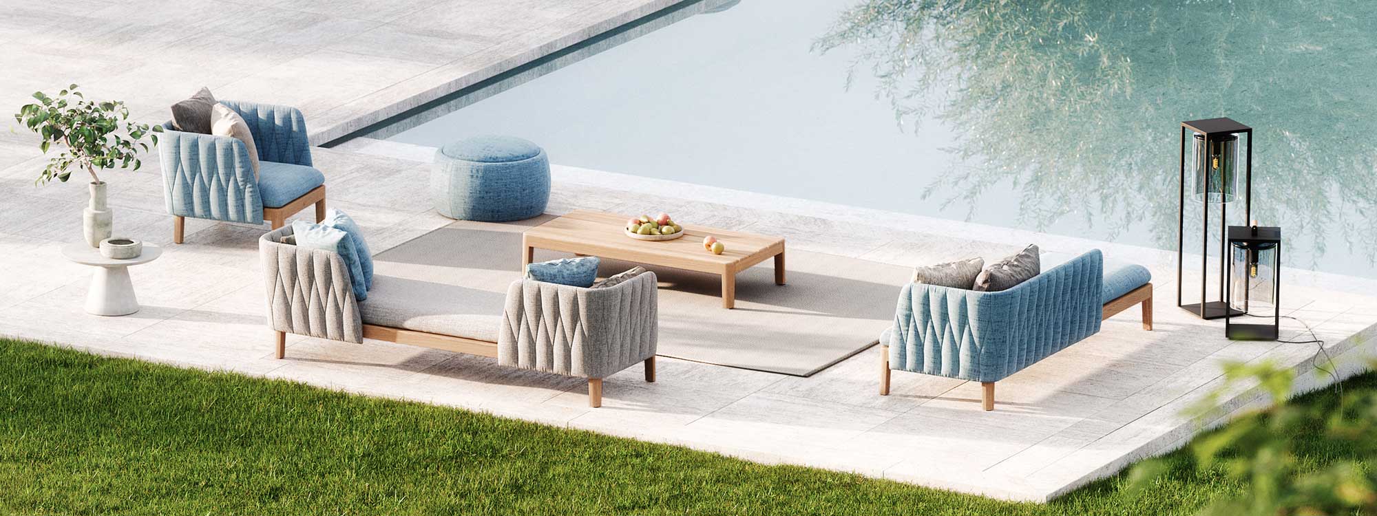 Image of Royal Botania Calypso lounge furniture in light blue and grey on poolside