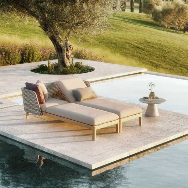 Image of twin configuration of Royal Botania Calypso adjustable garden daybeds beside swimming pool