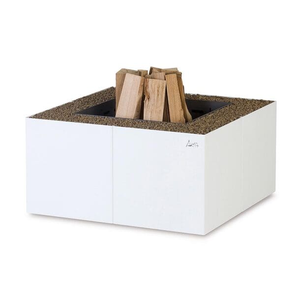 Studio image of white AK47 Dado geometric fire pit with unlit logs placed inside the burning chamber