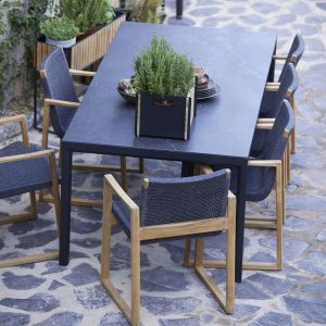 Image of black Drop table and Endless teak and black SoftRope chairs by Cane-line