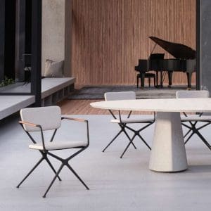 Image of Conix Table & Exes Modern Garden Dining Chairs with grand piano in background by Royal Botania