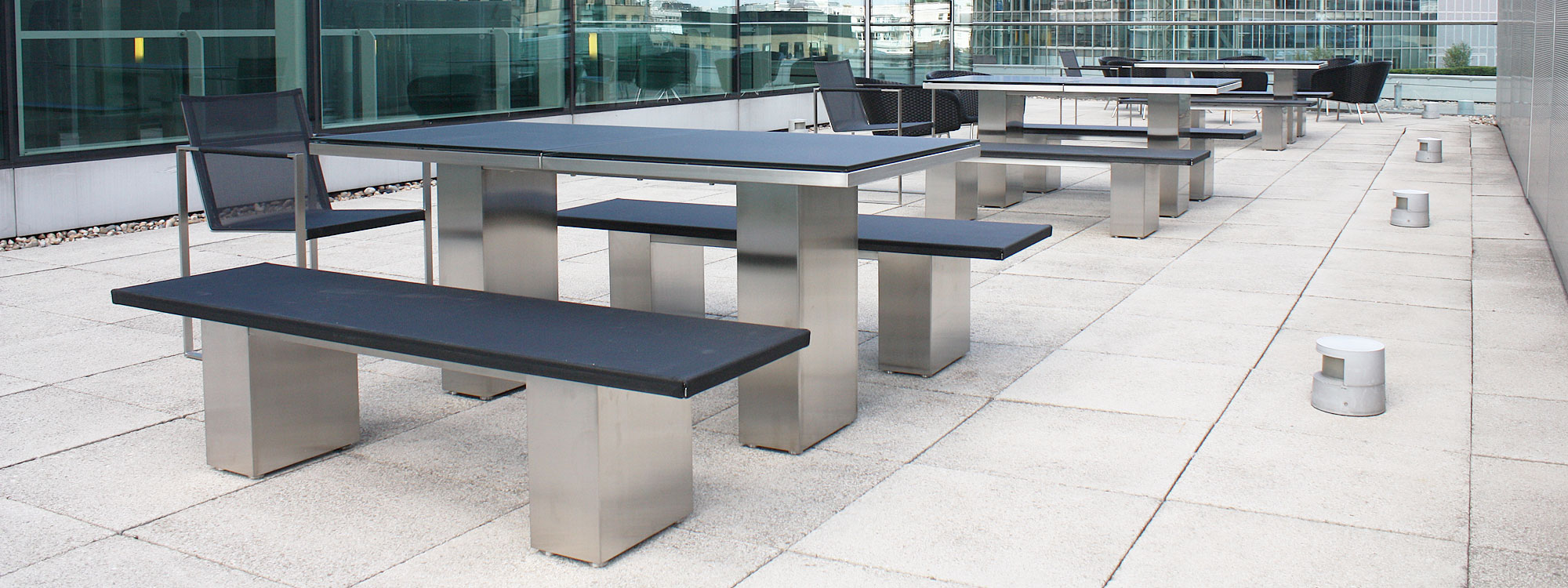 Image of City of London outdoor furniture installation of FueraDentro Doble table and benches