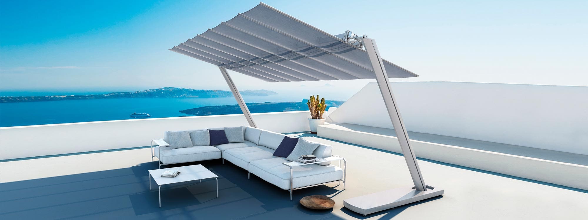 Image of Flexy Zen freestanding awning above Coro Sabal modern garden sofa