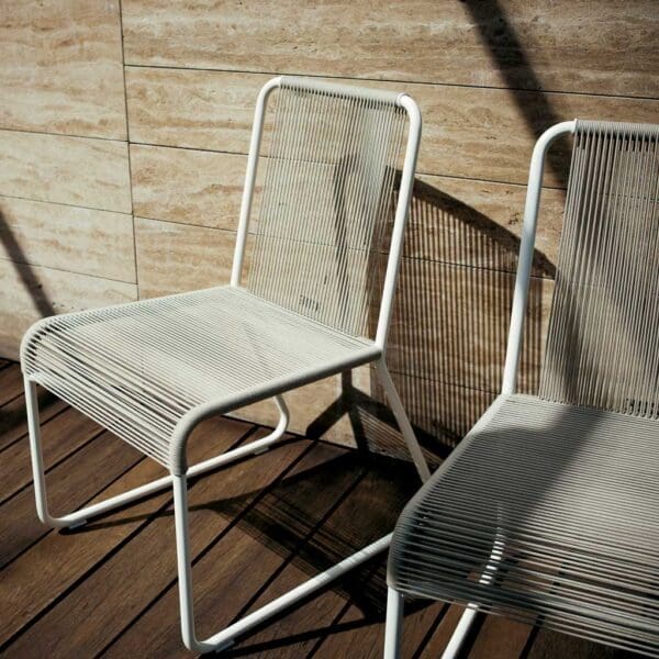 Image of pair of Harp garden chairs with milk-coloured frame and sand-coloured polypropylene rope back