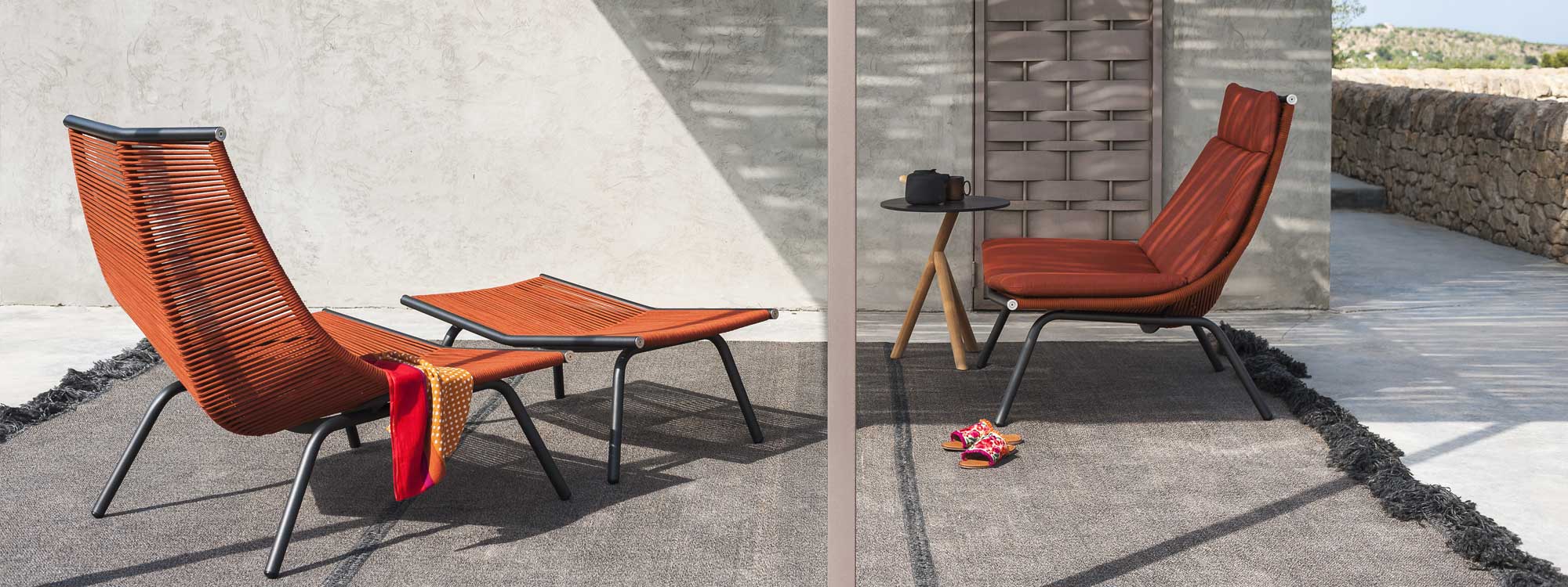 Image of pair of orange Laze garden chairs on modern terrace