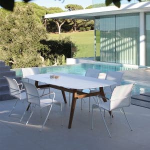 Image of QT55 & Zidiz garden dining furniture by Royal Botania on minimalist patio next to swimming pool