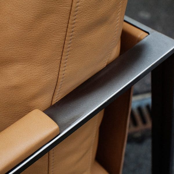 Image of detail of leather armrest for Monaco luxury leather lounge furniture by Roshults, Sweden