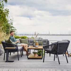 Image of Ocean grey outdoor sofa and Level teak and aluminium low table by Caneline