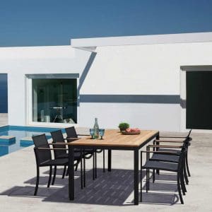 Image of Royal Botania Taboela table with anthracite frame and teak top and OZON chairs in anthracite