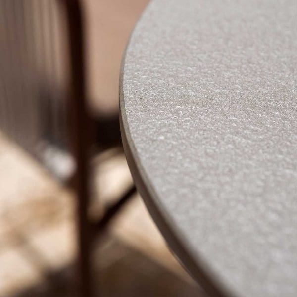 Image of detail of Piper extendable table's ceramic table top curved corners