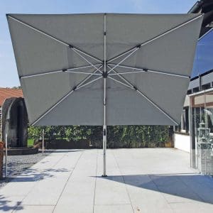 Image demonstrating how Shademaker Polaris parasol's canopy can be tilted in many different orientations