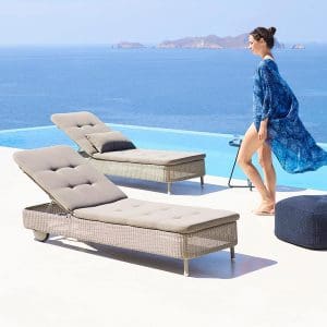 Image of pair of taupe Presley rattan sun loungers with taupe cushions by Cane-line