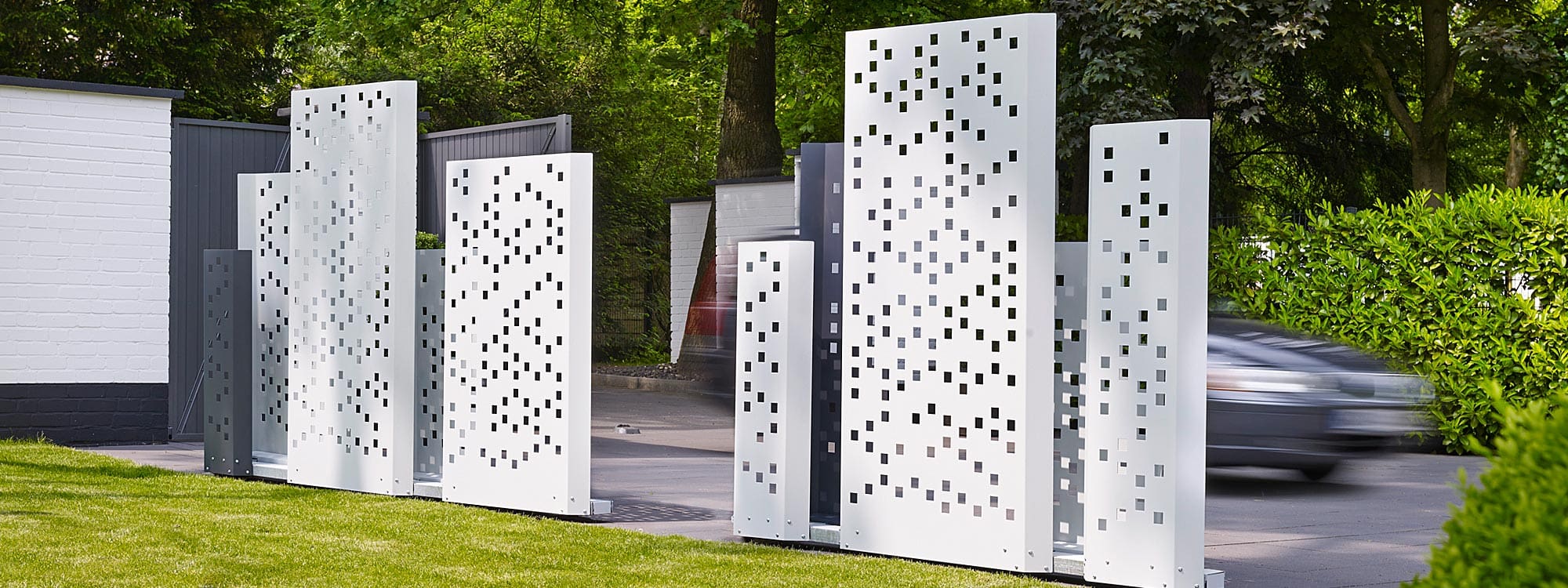 Image of Separo white geometric outdoor screens by Flora, shown in range of different sizes