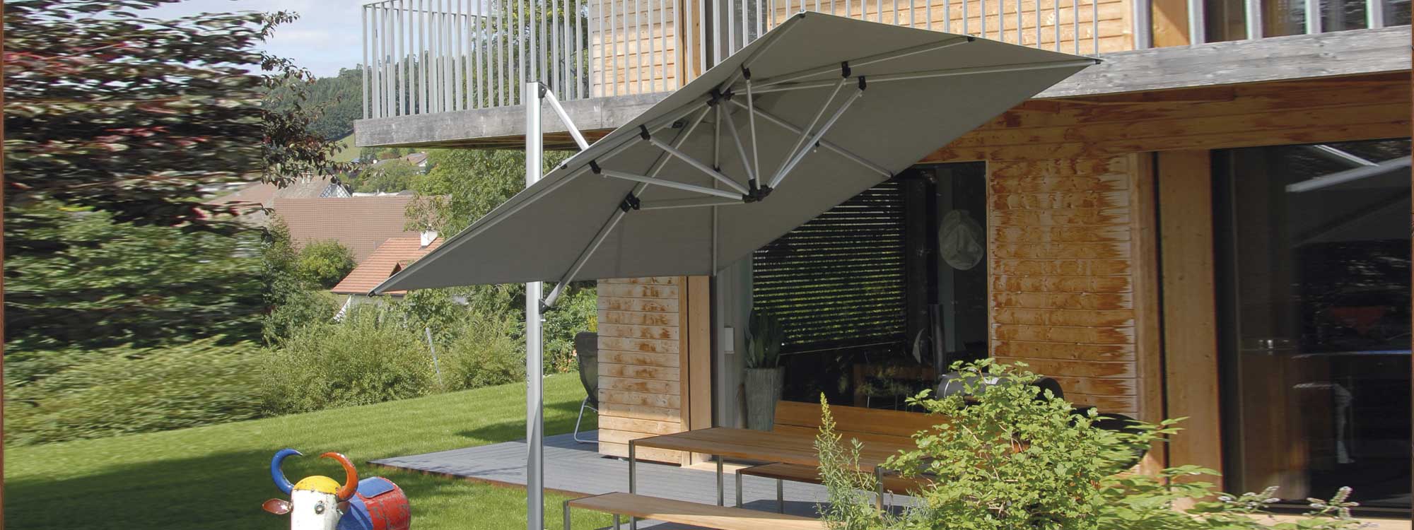 Image of Shademaker Sirius easy to use cantilever parasol on terrace in private back garden