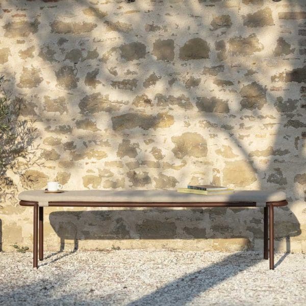 Image of Todus Starling garden bench seat in light and shade of terrace