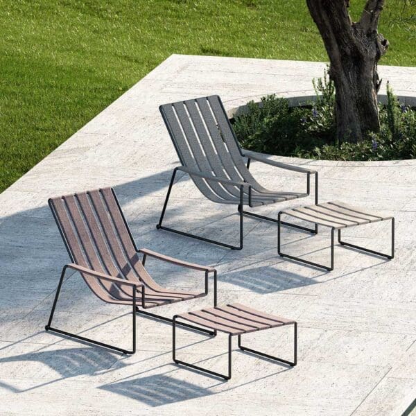 Image of pair of Strappy lounge chairs and foot stools by Royal Botania