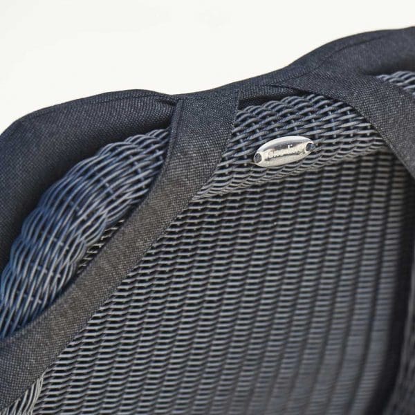 Image of detail of Sunrise reclining chair's graphite Cane-line weave construction and Cane-line Natté cushion by Cane-line garden furniture