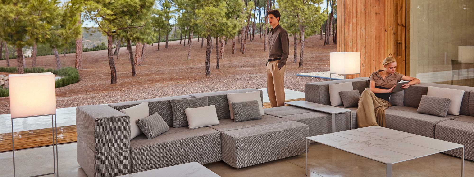 Image of Vondom Tablet modern garden sofa in neutral upholstery, with dry woodland in the background