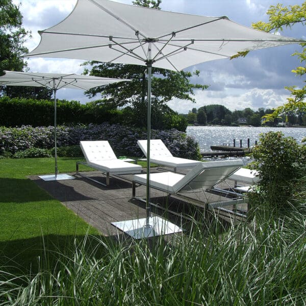 Image of White Square Zero Horizon TUUCI Ocean Master Centre with FueraDentro Siesta sun loungers in the background
