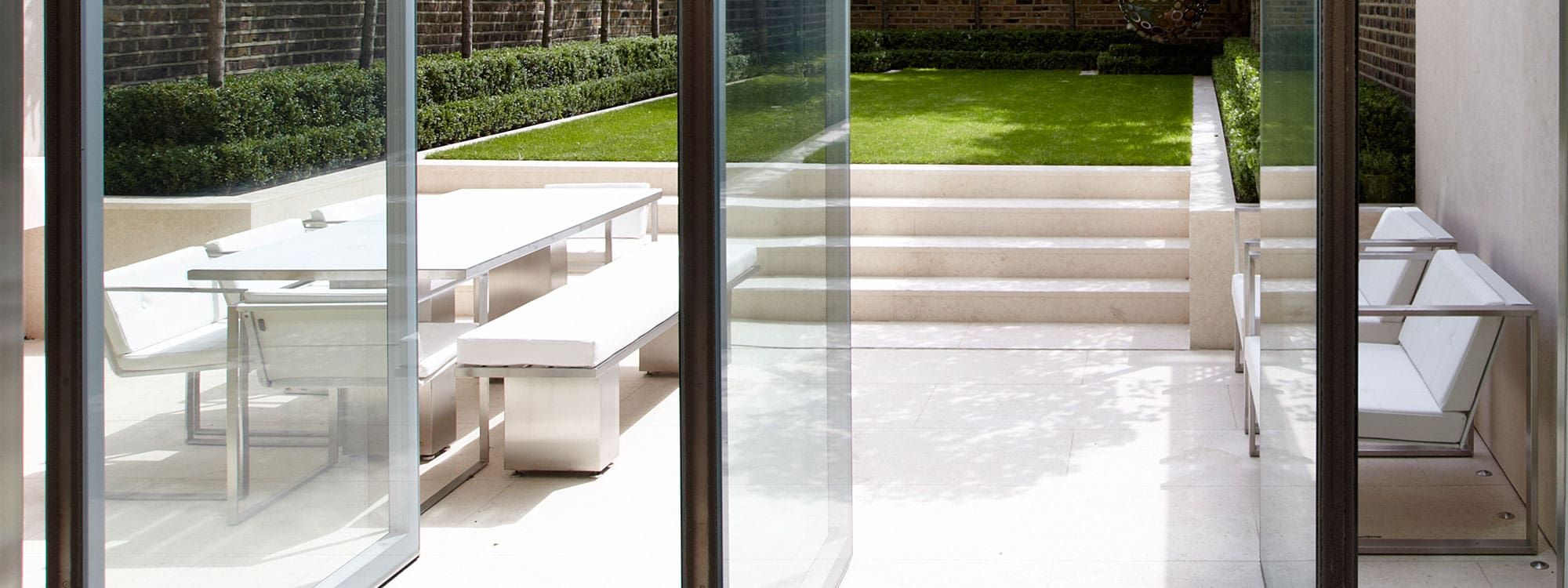 Image of FueraDentro minimalist design outdoor furniture in London back garden
