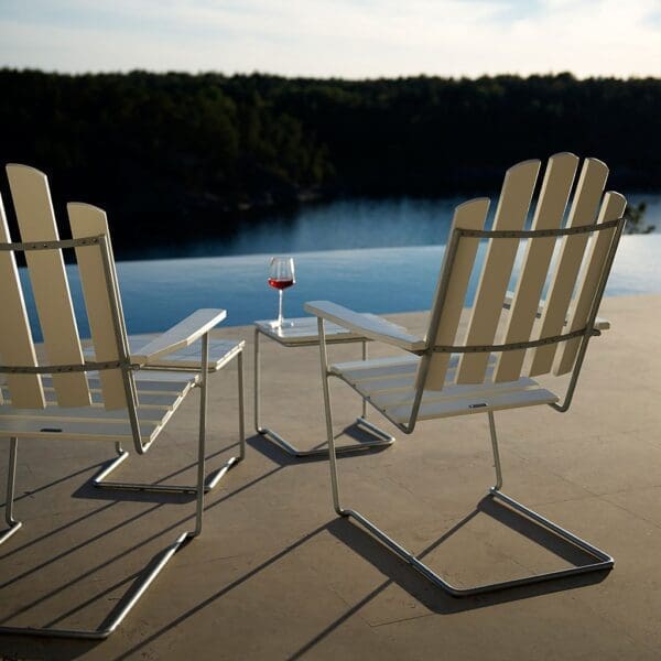 Image of pair of Grythyttan A3 vintage garden relax chairs and a foot stool, shown with galvanised steel frames and white lacquered oak surfaces