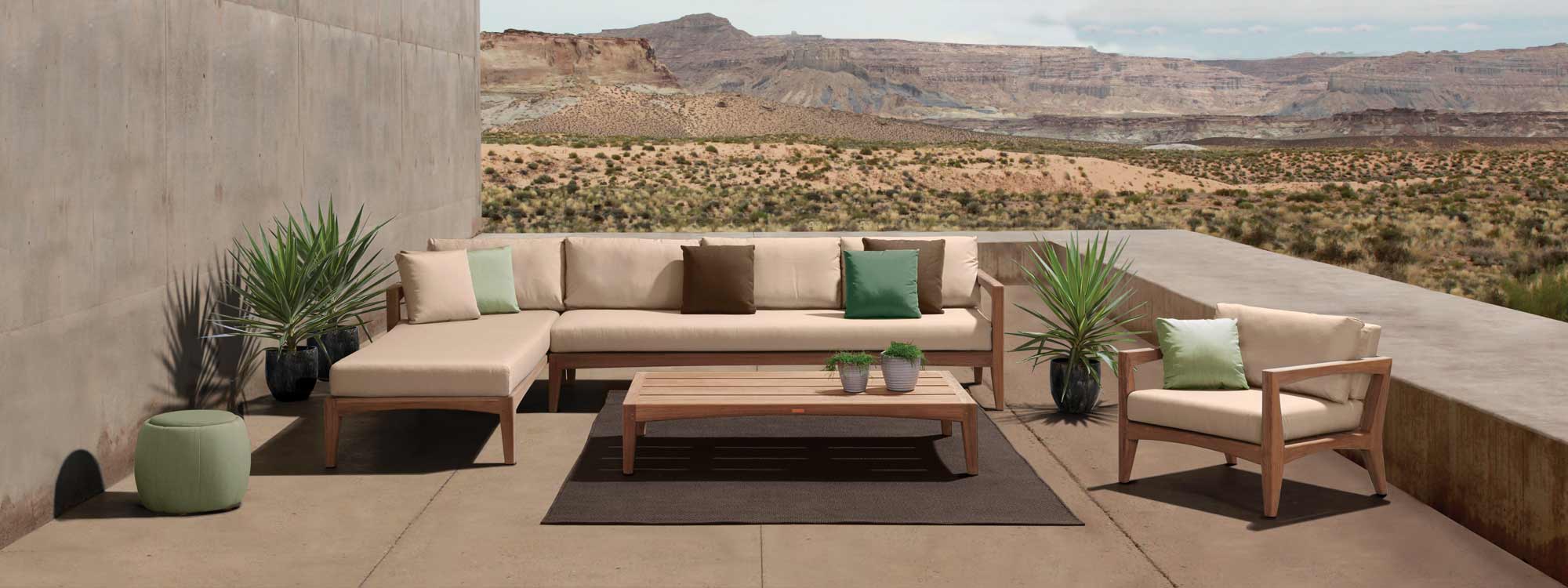 Image of Zenhit Lounge with Ecru cushions by Royal Botania with parched landscape in background