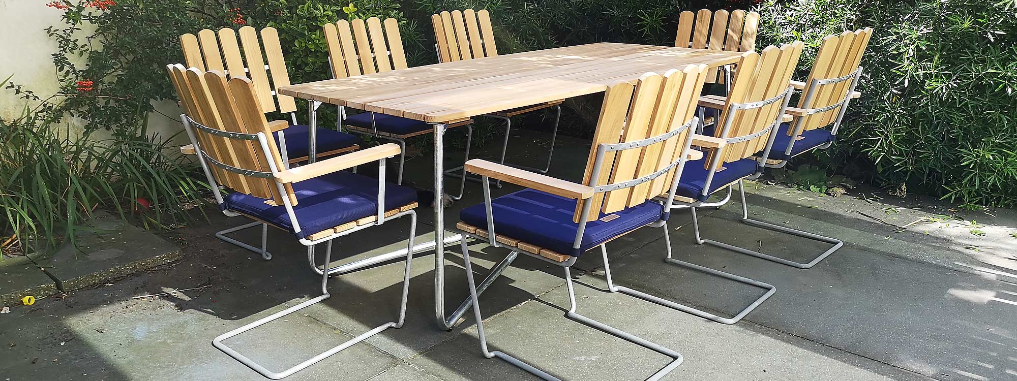 Image of London installation Of Grythyttan Swedish Garden Furniture including A2 Cantilever Garden Chair & B30 190 Table In galvanised steel and FSC certified teak