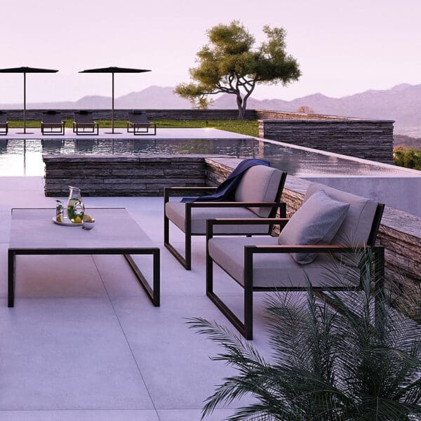 Image of Royal Botania Ninix Lounge on swanky terrace at dusk