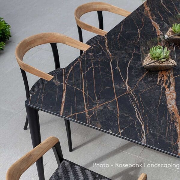 Image of UNITE table with Volcano Black ceramic top & anthracite-colored Jive chairs by Royal Botania