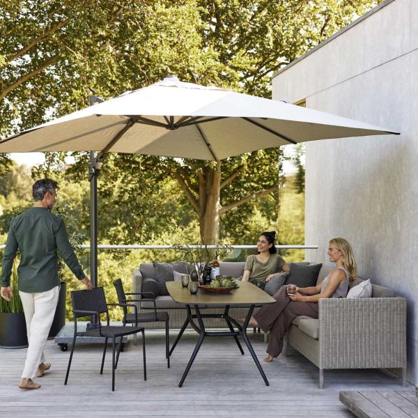 Image of Connect Dining Lounge corner sofa, which can be used as dining seating thanks to its slightly raised seat height, by Cane-line garden furniture